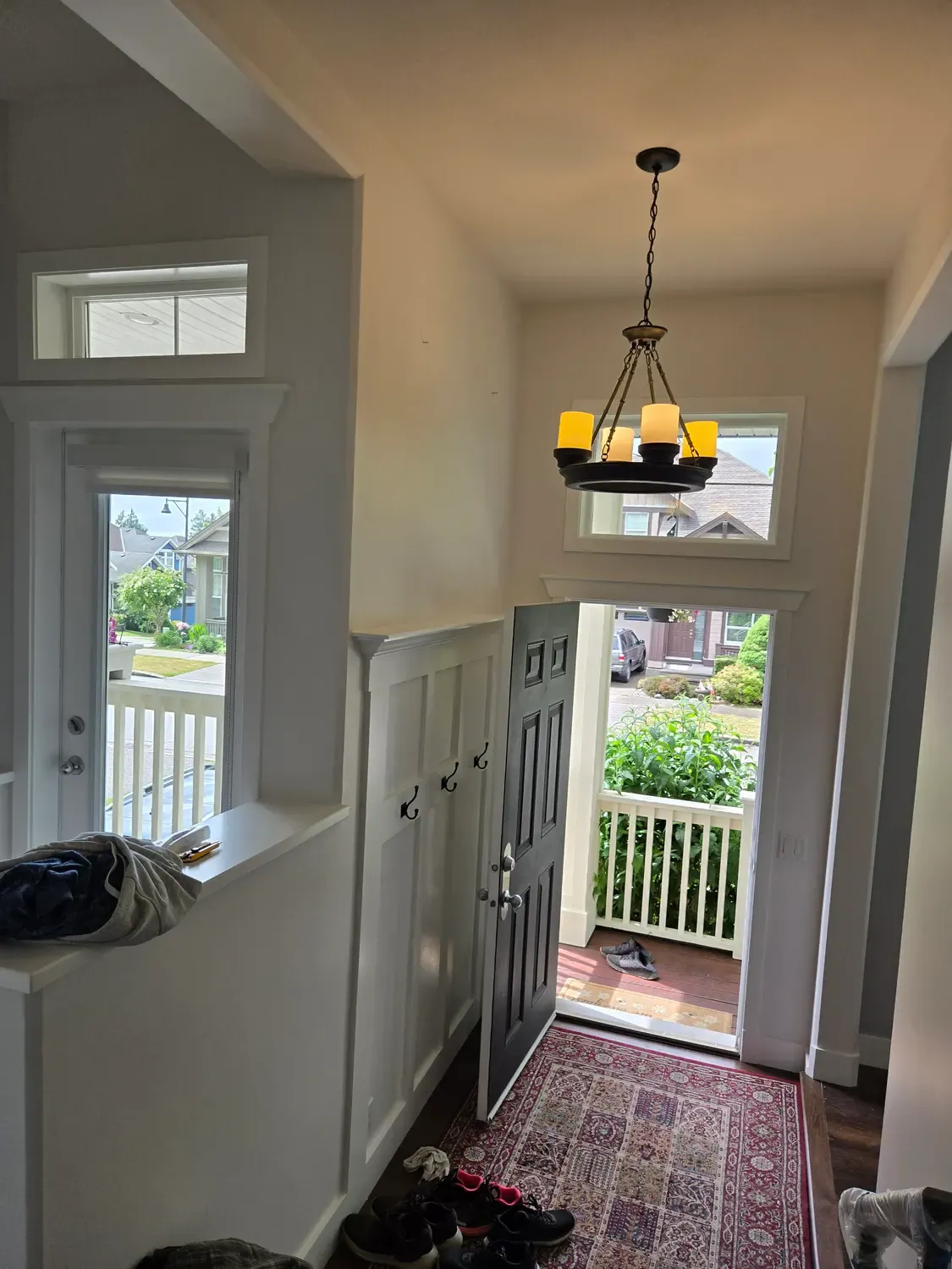 Front entry with fresh white wainscoting