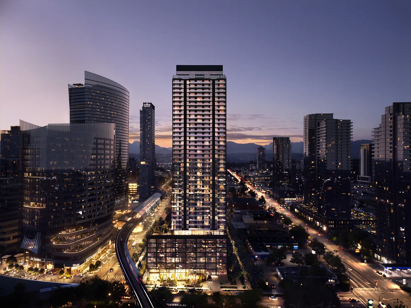 Residential tower lit up at dusk over the city